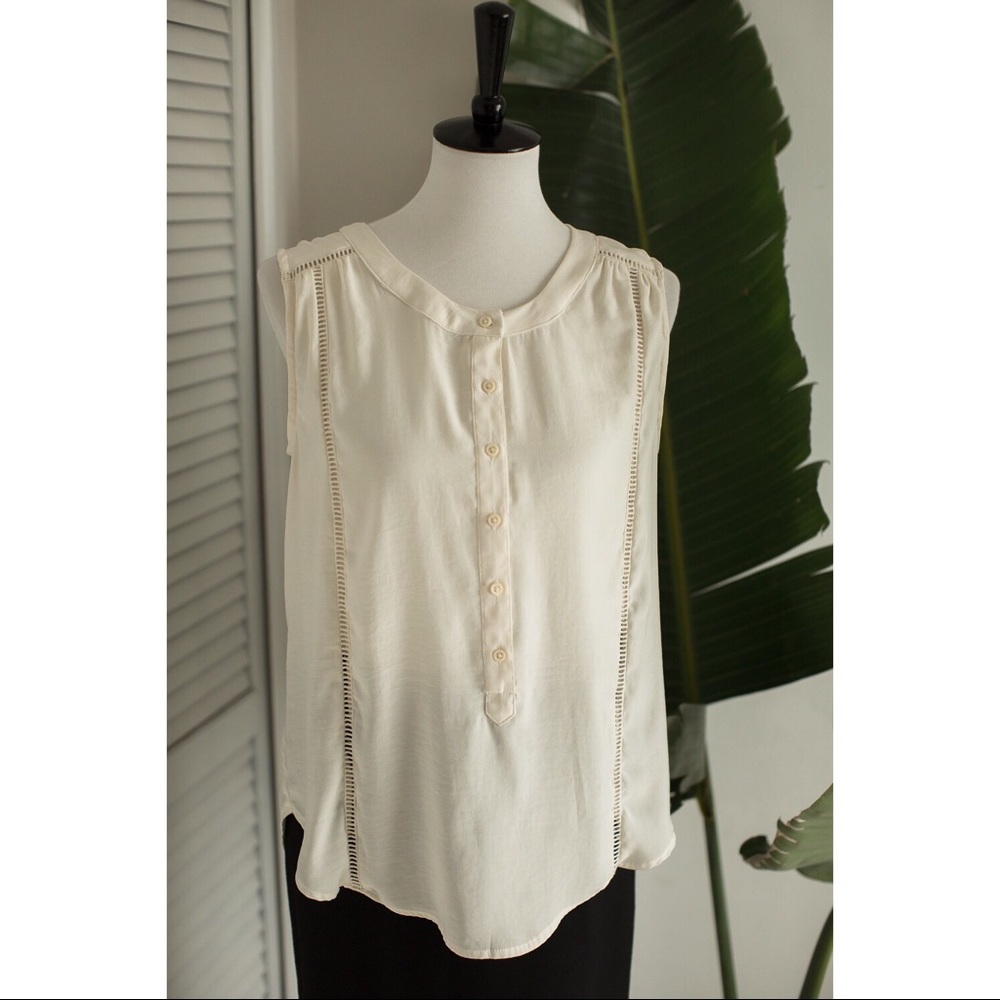 Cream sleeveless button down tunic